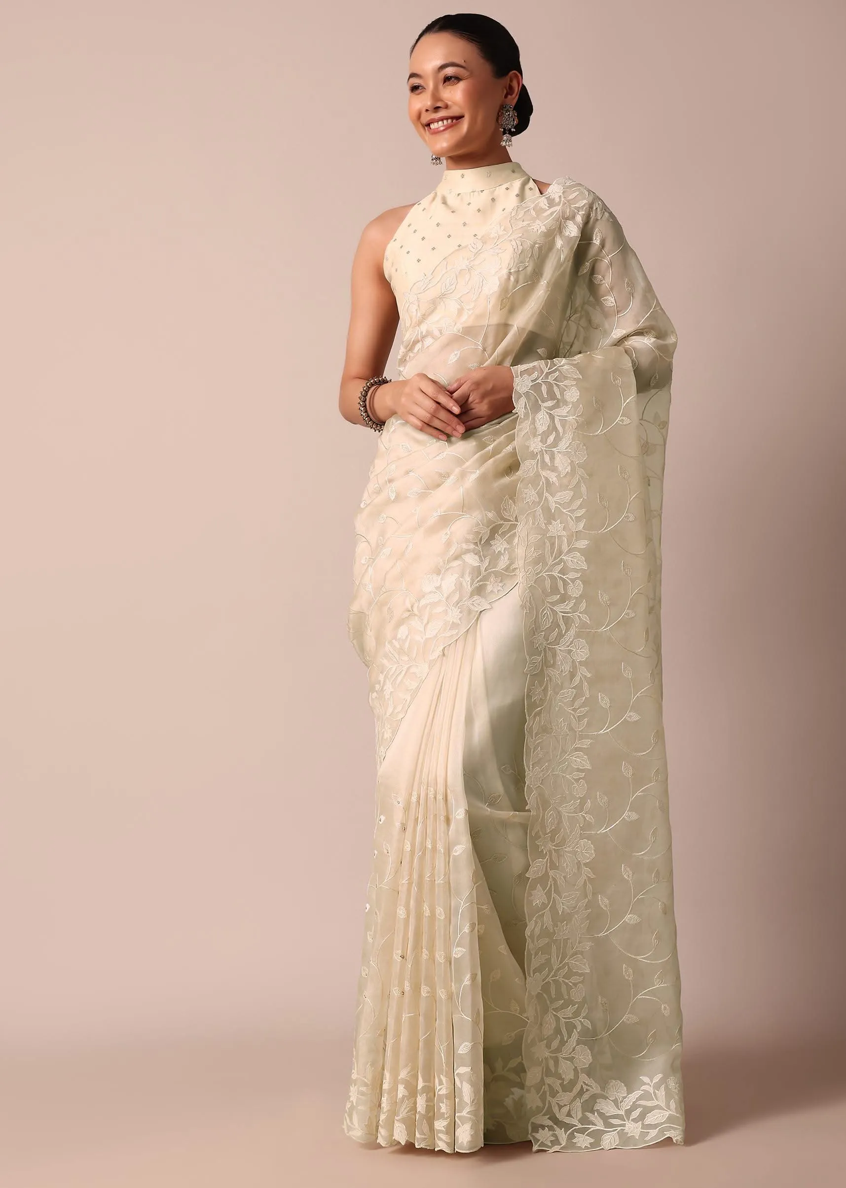 Beige Soft Organza Saree With Floral Work And Unstitched Blouse Piece